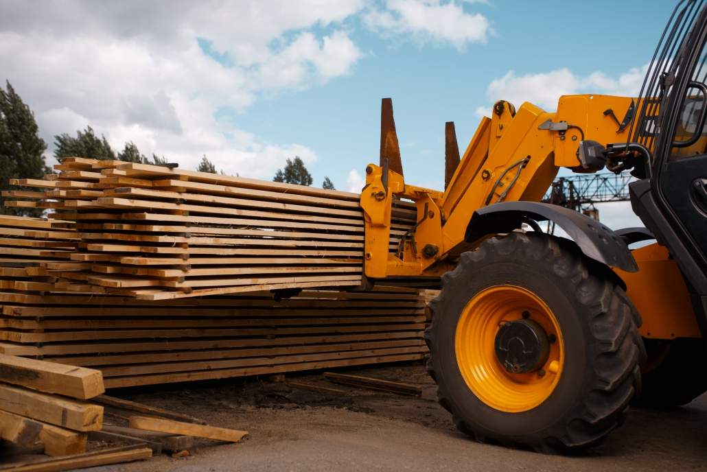 forklift-loads-the-boards-in-the-lumber-yard-2021-08-27-09-55-42-utc-1030×688[1]